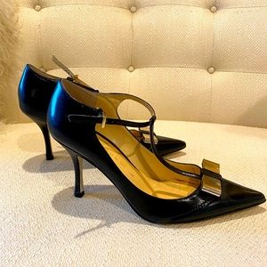 Stunning Designer black heels with metal bow